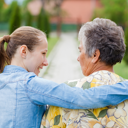 Image of caregiver and older adult