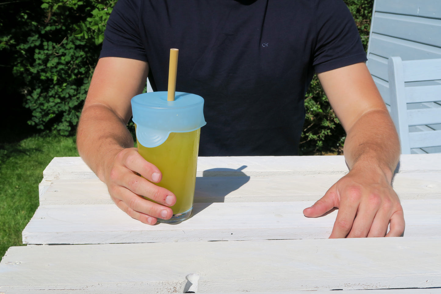 cup cap on glass of lemonade outside